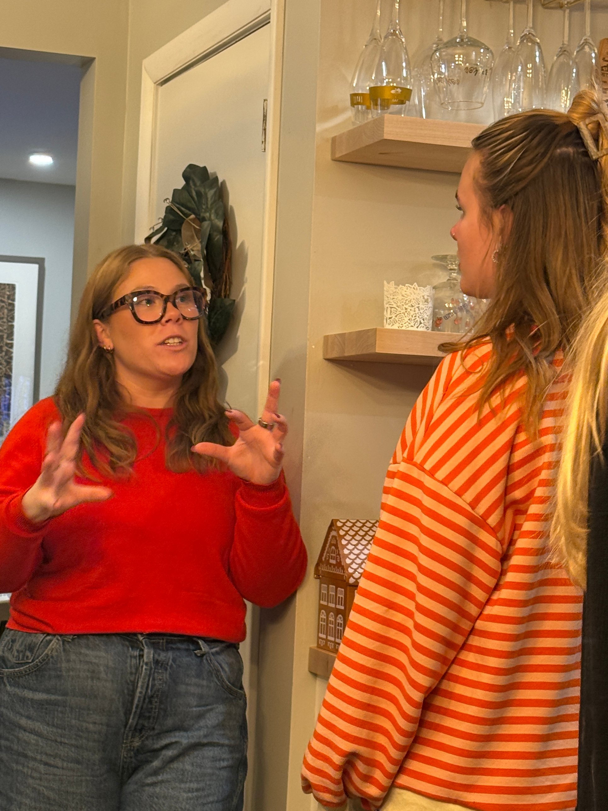 Two people talking at a Grace Hill gathering